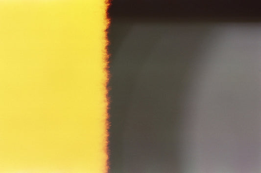 yellow and black striped textile